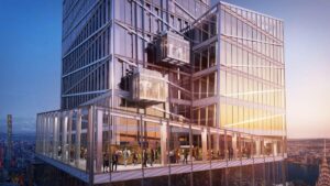 View of Summit One Vanderbilt observation areas with the sun shining on the building at dusk